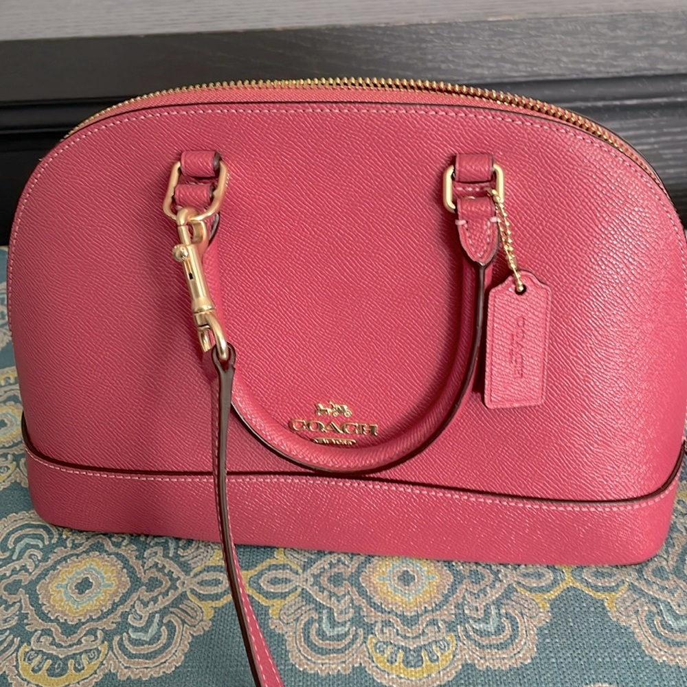 Pink Coach purse with shoulder strap. NWT.